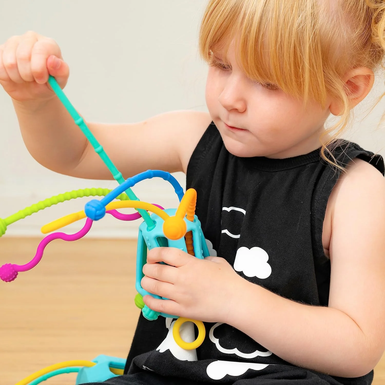 Zippee Pull String Sensory Activity Toy with Unique Textures & Sound-Producing Cords - Image 2